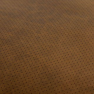 スーパーレザーテックス生地のクッション裏面には、空気抜け用に細かな穴を加工しています。