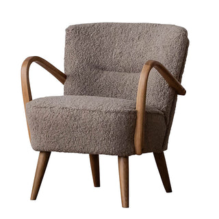 優雅な曲線の木肘とシックな生地が、レトロで上品な印象を与えます。